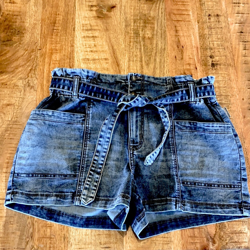 We are selling mid waist jean shorts in size XL.